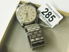 A 1959 Rolex wrist watch with 3,6,9 face. (Not original strap and minor scratches to glass).