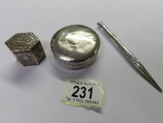 A superb continental pill box, another silver box and a silver propelling pencil.