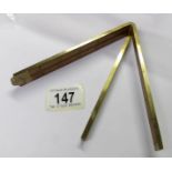 A Stanley No.62 1/2 24" brass and wood folding ruler.