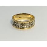 A 9ct gold and diamond band ring, size N.