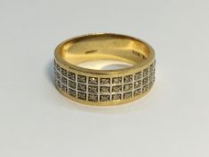 A 9ct gold and diamond band ring, size N.