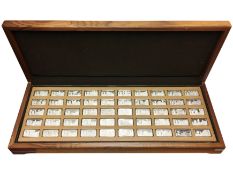 A cased set of 50 "1000 Years of British Monarchy" silver ingots.