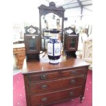 An old mahogany dressing table with 2 doors above 2 over 2 drawers.