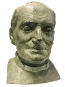 A bronze bust of a mans head, possibly Russian.