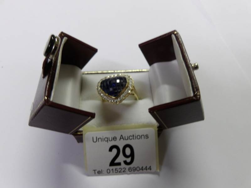 An 18ct gold sapphire and diamond heart shaped ring, size U. - Image 5 of 7