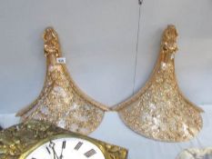 2 gilded wall brackets.