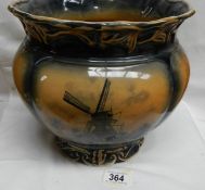 A large Staffordshire jardiniere depicting windmills. Approximate height 24cm/ 9 1/2", diameter 25.