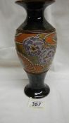 A Doulton Slater's patent vase with attractive pattern of lilac flowers with brown centres of a