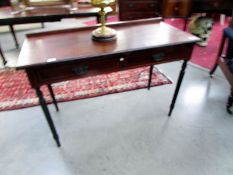 A mahogany 2 drawer writing desk in good condition.