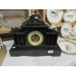 A 19th century slate mantel clock with French movement stamped Japy Freres & Co., God. Med.