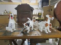 5 Royal Doulton dog figures.