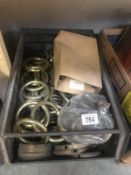 A large quantity of antique brass curtain rings