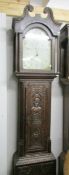 A carved oak 30 hour long case clock marked Wm. Bowers, Chesterfield.