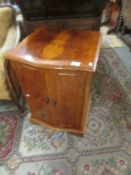 A yew wood effect cabinet.