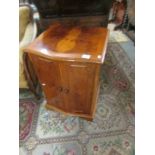 A yew wood effect cabinet.