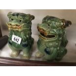 A pair of Chinese pottery Dogs of Foo