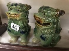 A pair of Chinese pottery Dogs of Foo