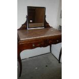A 1920's french marble top washstand with mirror back and 2 drawers.