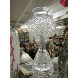 A cut glass table lamp.