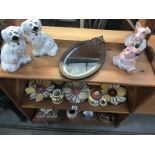 A quantity of pottery items including Wade pigs, Staffordshire etc.