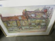 A Gordon Cumming hand coloured print of Jew's House, Steep Hill, Lincoln,