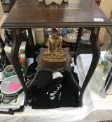 An Edwardian mahogany side table