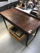An Edwardian mahogany desk with inlaid drawer fronts