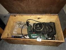 A wooden toolbox with a Bosch electric drill & drill bits