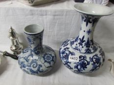 2 Chinese style blue and white vases.