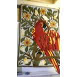 A Wool wall hanging/rug in a parrot design.