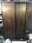 A vintage oak key cabinet