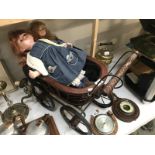 A vintage style dolls pram with 2 porcelain collectors dolls