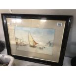 A framed and glazed watercolour of a seascape