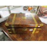 A mahogany brass bound writing box.