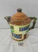 A Beswick cottage ware teapot.