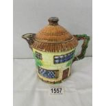 A Beswick cottage ware teapot.