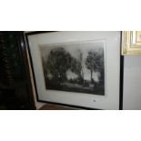 A framed and glazed print depicting dancers in a wood.