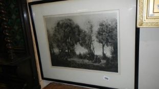 A framed and glazed print depicting dancers in a wood.