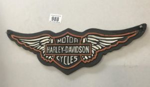 A cast iron Harley Davidson advertising sign