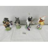 4 boxed John Beswick pig band figures.