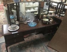 A stag darkwood stained dressing table