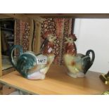 2 pottery cockerel jugs.