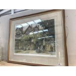 A large framed and glazed limited edition print of a Tudor house