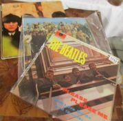 4 Beatles LP records - Please Please Me (Mono), Sgt Peppers Lonely Hearts Club,