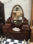 An inlaid mahogany dressing table with mirror