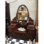 An inlaid mahogany dressing table with mirror