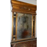 A large period overmantel mirror.
