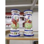A pair of fine continental porcelain vases decorated with birds.