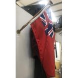 A vintage motor launch/boat flag & mast