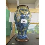 A Royal Doulton vase.